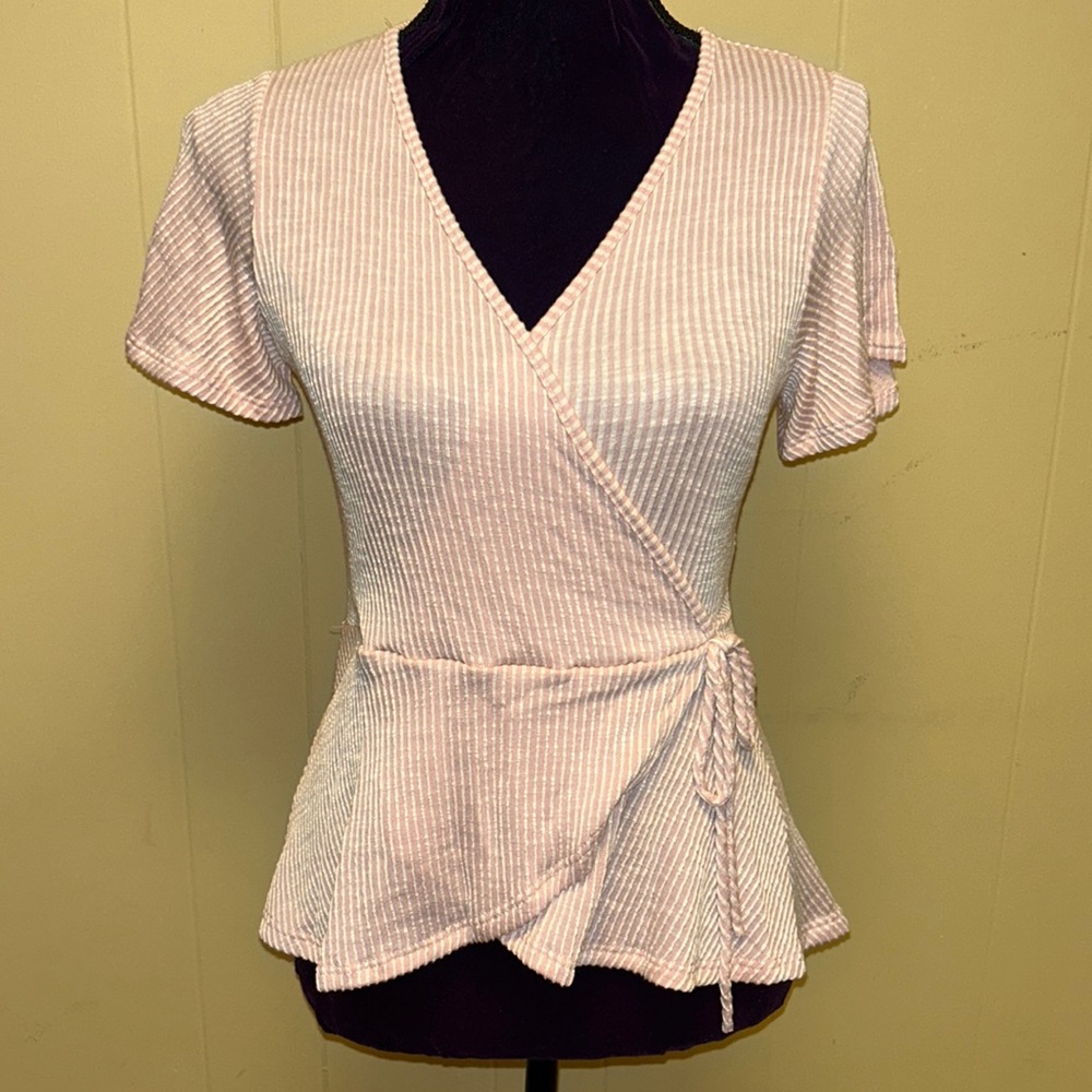 Pink peplum top